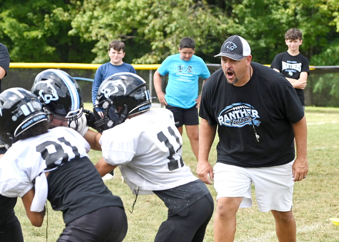 A few familiar faces: Grassi, Klezek in charge of PC, CC football